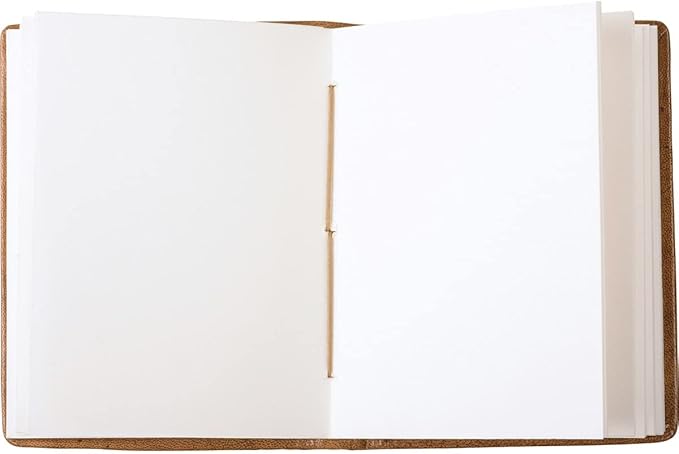 Primitives By Kathy Leather Bound Journal Featuring an Intricate Debossed Bee Design on the Front Cover. The Bee Journal Includes 96 Unlined Pages.