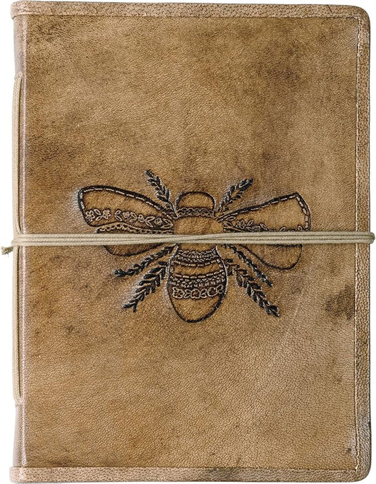 Primitives By Kathy Leather Bound Journal Featuring an Intricate Debossed Bee Design on the Front Cover. The Bee Journal Includes 96 Unlined Pages.